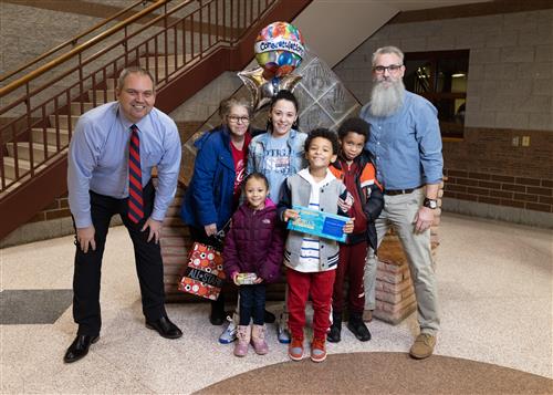 Photo of Coloughizo Burns and family