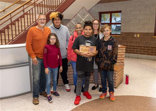 Jesus Torres Rosario, Wilson Middle Schools, October 2022 Stairclimber, posing with family members.