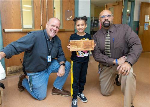 Harding's October 2022 Stairclimber, Alana Poston, posing w/Asst. Principal Jeff Yonkers and DEI Coordinator Ken Nickson.