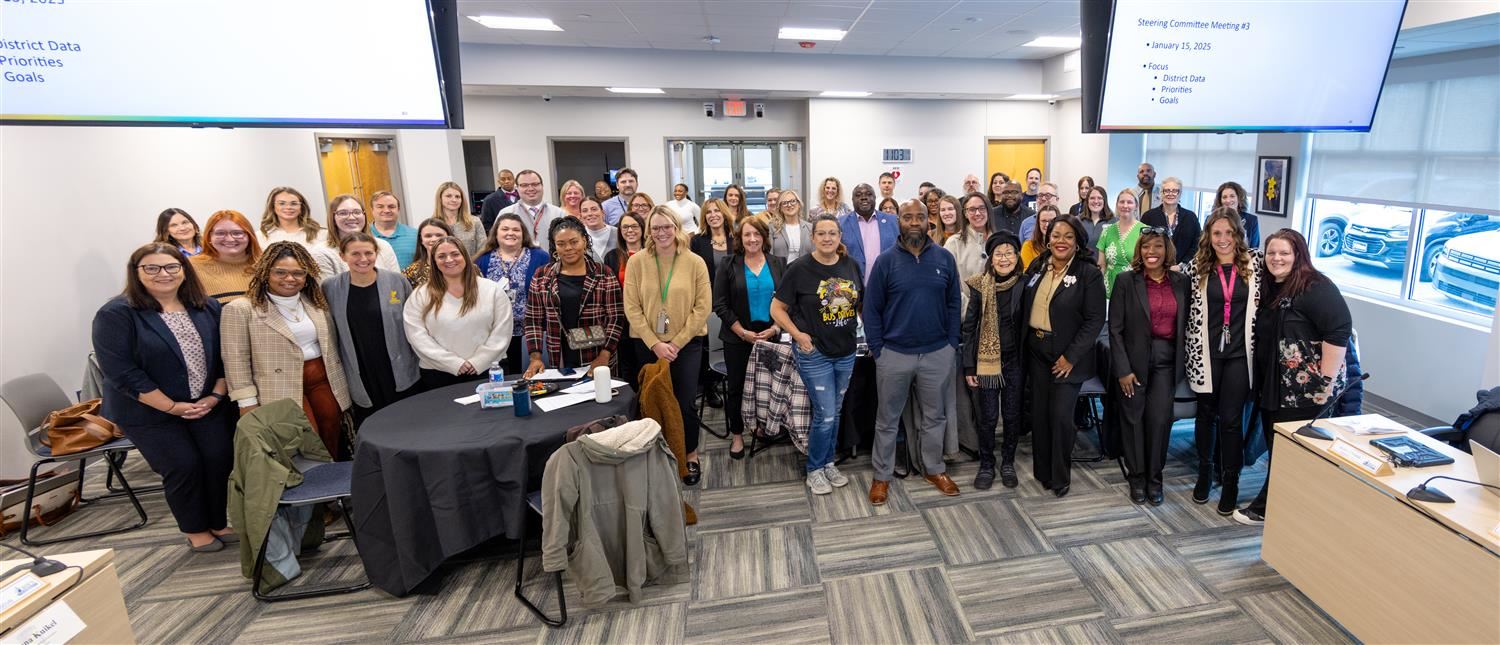 A panoramic group shot of all members of the Strategic Plan Steering Committee