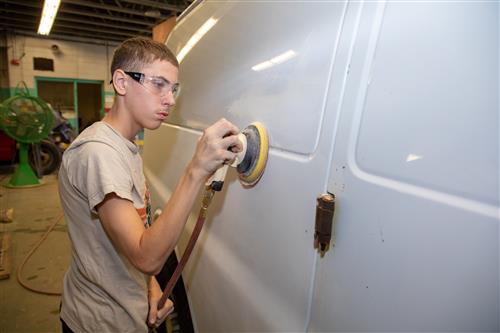 Part of the auto body program includes buffing and polishing 